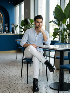 Stylish Café Portrait with Blue Striped Shirt