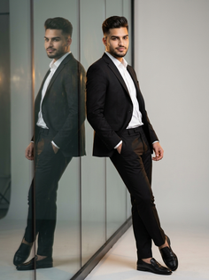 All-Black Suit Reflective Glass Studio Portrait
