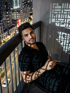 Geometric Shadow Balcony Portrait at Night