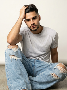 Oversized Distressed Denim Studio Portrait