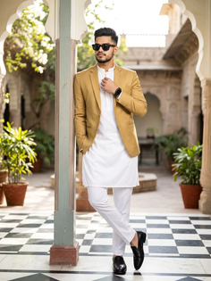 White Kurta Golden Blazer Courtyard Portrait