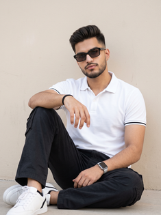 White Polo Shirt and Black Cargo Pants Fashion Portrait