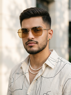 Amber Aviator Sunglasses and Pearl Necklace Fashion Portrait